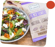Packaged fresh salad greens on a plate